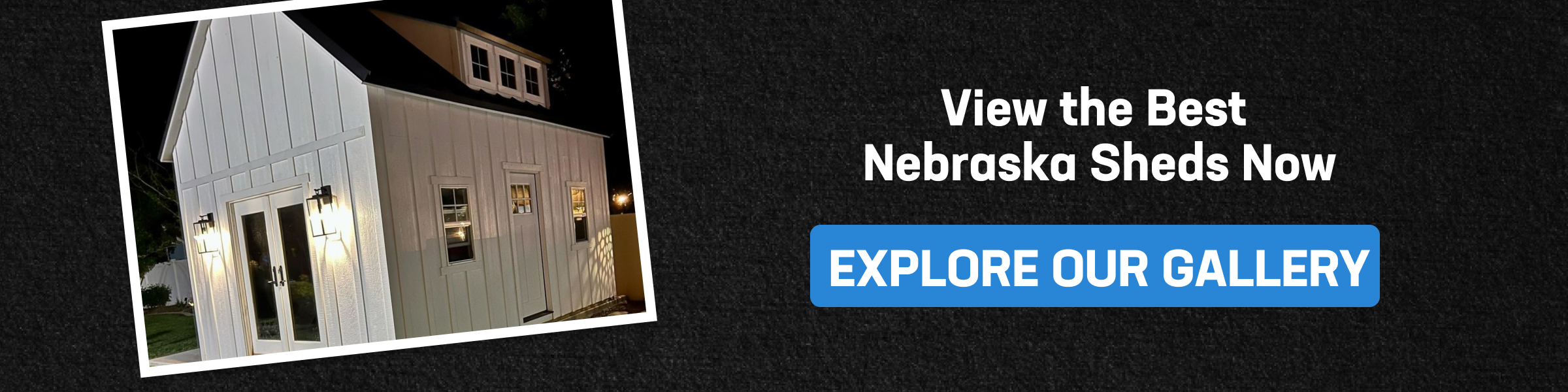 CTA banner with white shed lit at night, inviting users to explore our gallery and view the best nebraska storage sheds