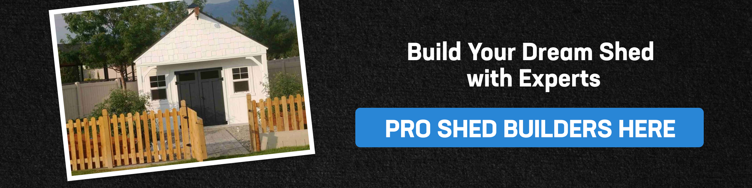 White backyard shed with black doors and picket fence promoting expert professional shed builders