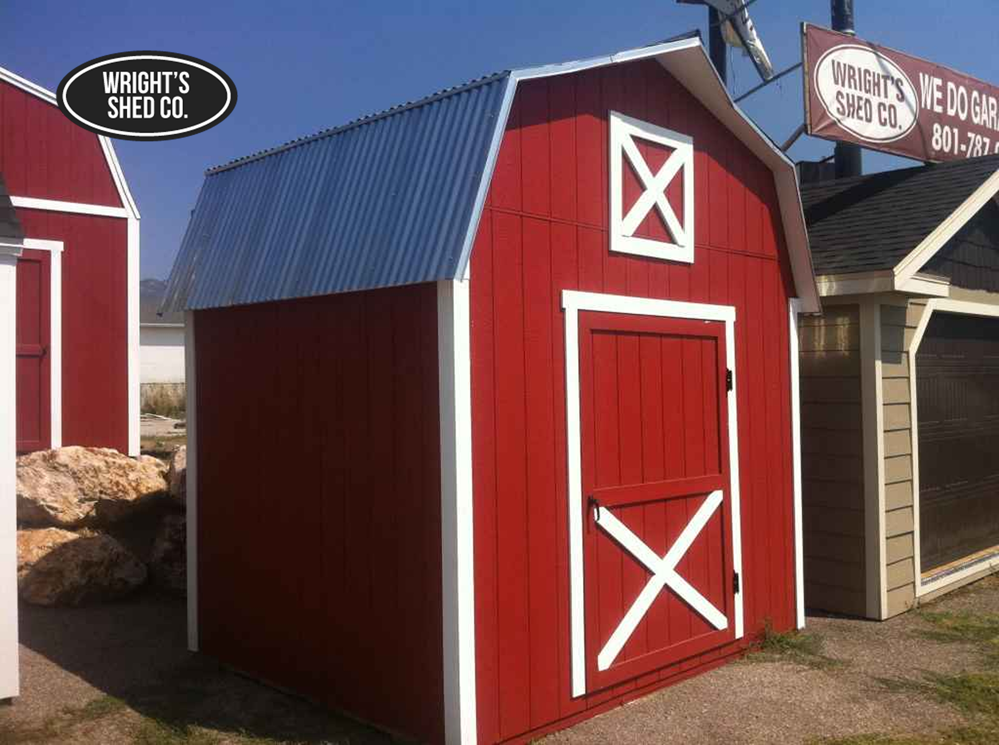 Custom Storage Shed Door Styles featuring red barn style shed with classic crossbuck door and metal roof design