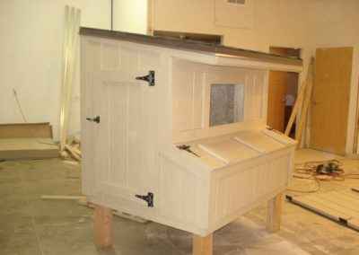 tan and white chicken coop