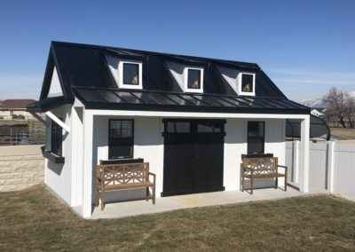 Black and white orchard with flat roof dormer