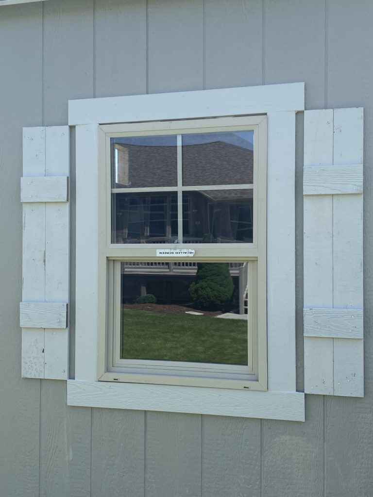 white trim around window on shed