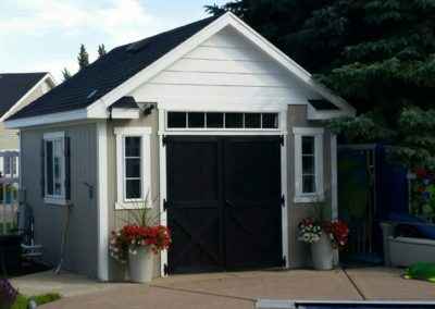 Orchard shed with eyebrow overhangs