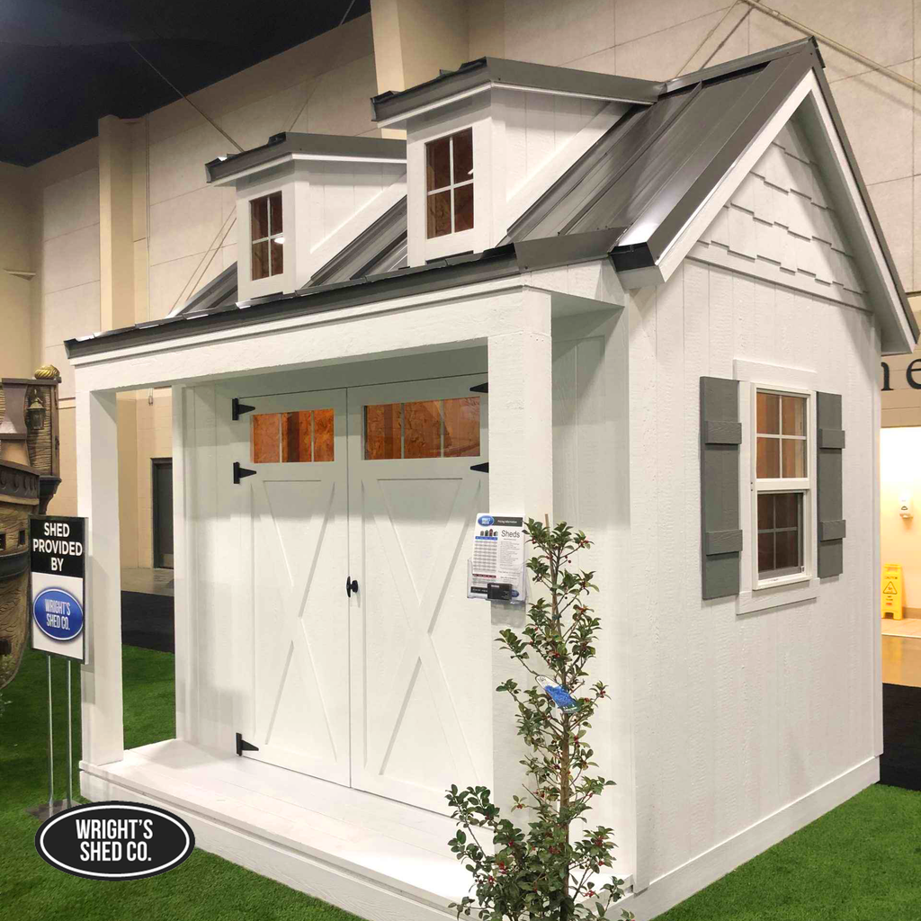 Custom garage-style shed with dormers and durable features supporting long-term shed investment cost.